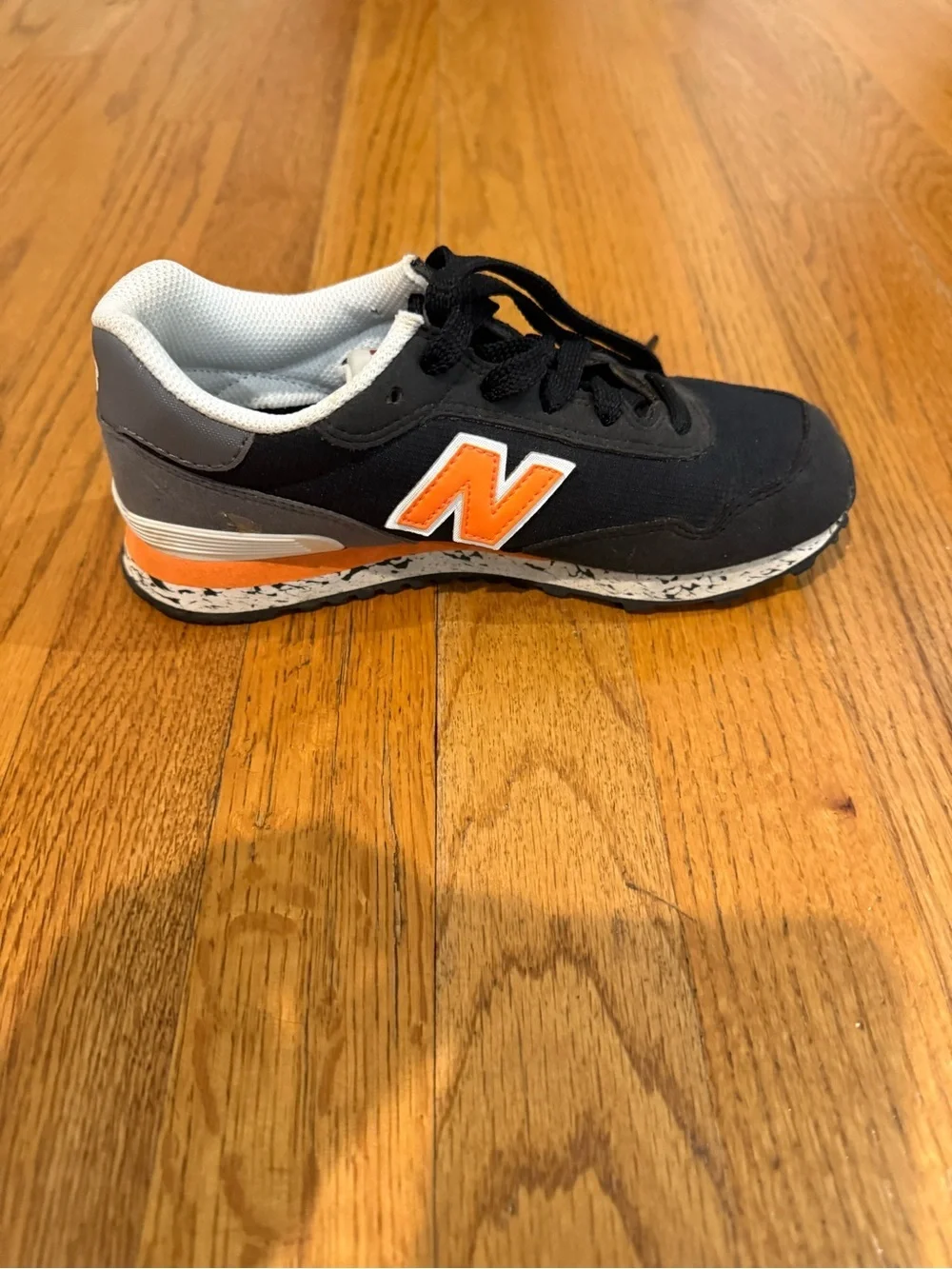New Balance Kids Black and Orange Low-Top Sneakers